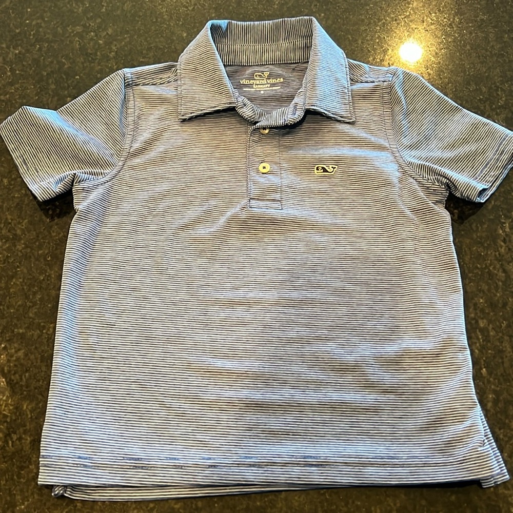 Vineyard Vines boys size 5 polo shirt in blue and white stripes.
